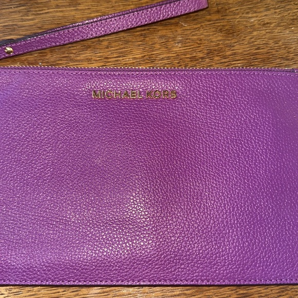 Michael Kors purple wristlet with gold zipper/ accents - Picture 3 of 7